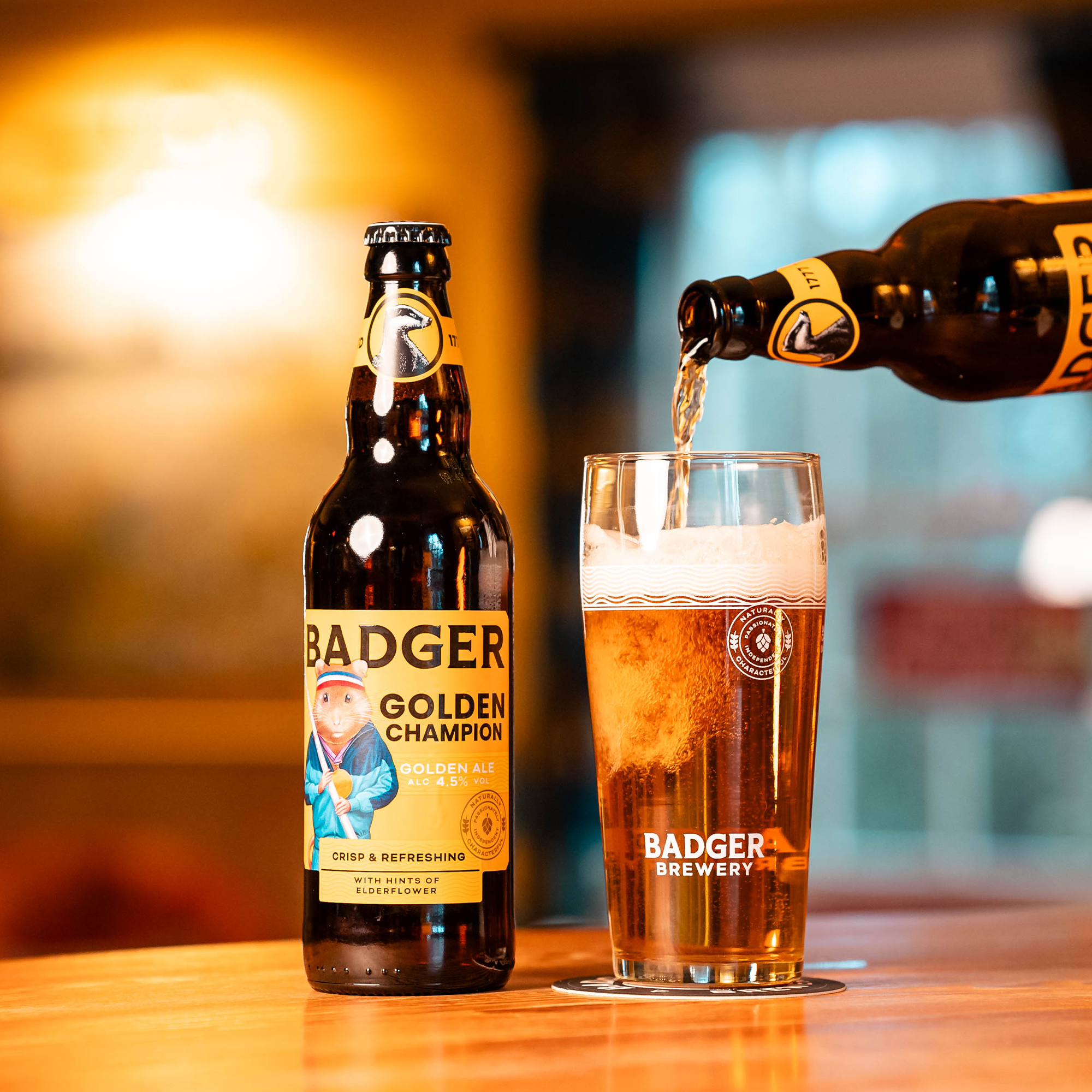 Golden Champion pouring into Badger Pint Glass